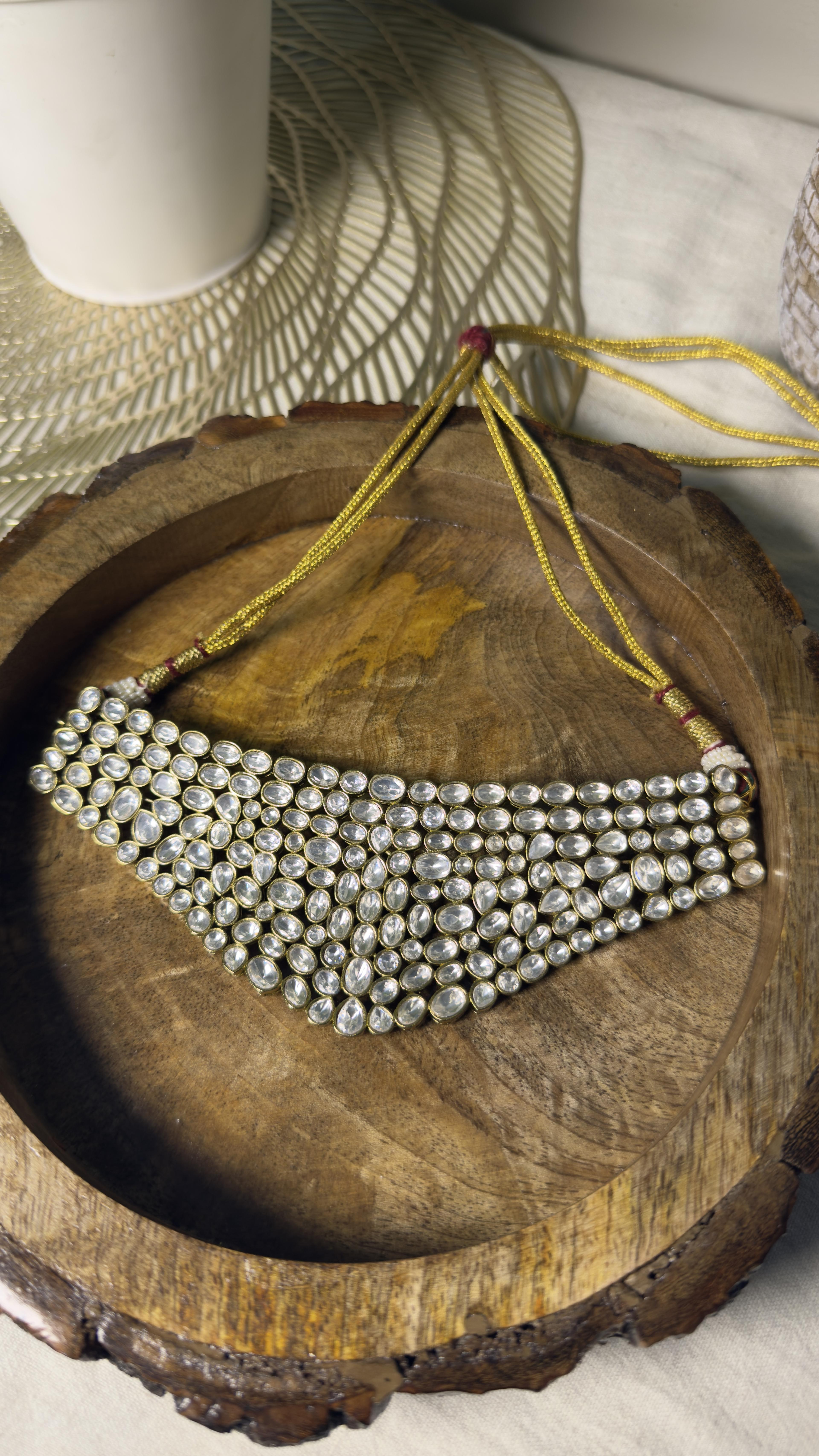Samridhi Multi-Row Polki Bridal Choker on wooden platter